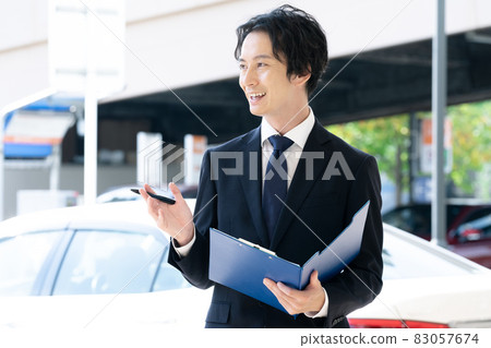 Salesman with file Salesman with file 83057674