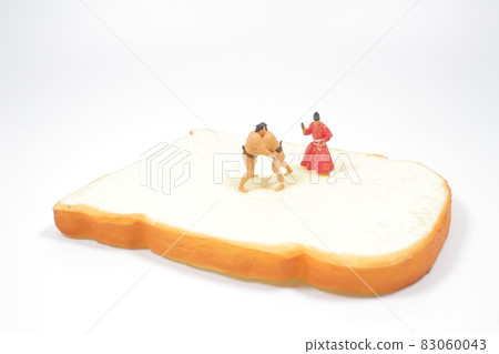 a mini a mini figure of sumo on the bread a mini a mini figure of sumo on the bread 83060043