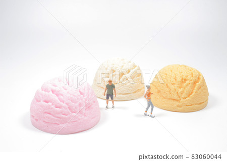 a mini of ifugre people near mini ice cream 83060044