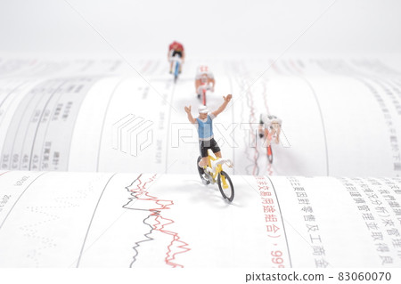 the Mini people, Small figures cycling on open book 83060070