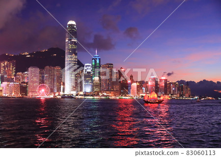 the Victoria Harbour , central at twilight, after sunset. 22 May 2021 the Victoria Harbour , central at twilight, after sunset. 22 May 2021 83060113