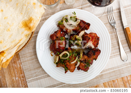 Oriental grilled pork meat shashlik Oriental grilled pork meat shashlik 83060195