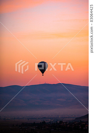 Bright hot air balloons in sky of Cappadocia, Turkey 83064425