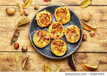 Autumn fresh buns or pumpkin pie 83064860