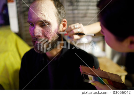 Zombie male makeup for halloween concept. Blood on skin face 83066042