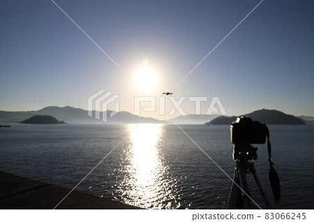 Drone flying toward the sun DJI, MAVIC Drone flying toward the sun DJI, MAVIC 83066245