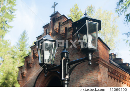 Lantern and old chapel at Wrede family cemetery. 18 September 2018 - Anjala, Kouvola, Finland. Lantern and old chapel at Wrede family cemetery. 18 September 2018 - Anjala, Kouvola, Finland. 83069300