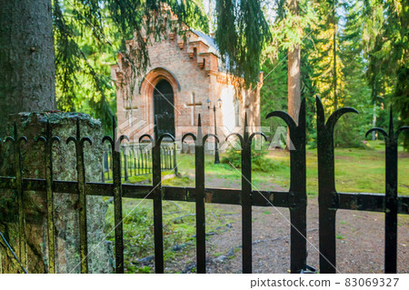 Black fence at old chapel at Wrede family cemetery. 18 September 2018 - Anjala, Kouvola, Finland. Black fence at old chapel at Wrede family cemetery. 18 September 2018 - Anjala, Kouvola, Finland. 83069327