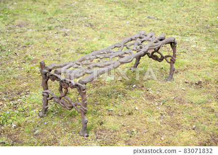 Forged bench at old beautiful semetery in Finland. 83071832