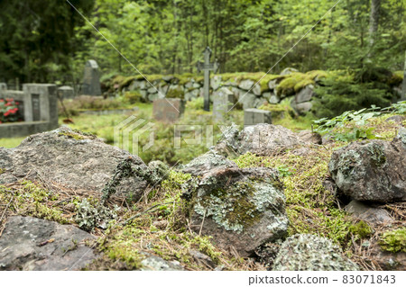 Old semetery in Finland with grave crosses and stones. Old semetery in Finland with grave crosses and stones. 83071843