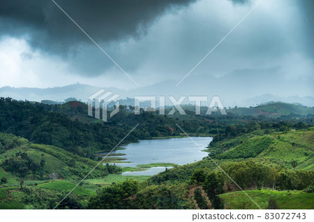 Rainstorm on mountain and lake in rainforest at national park 83072743
