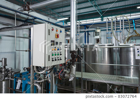 Control panel of stainless pipeline and tanks system at beverage processing plant Control panel of stainless pipeline and tanks system at beverage processing plant 83072764