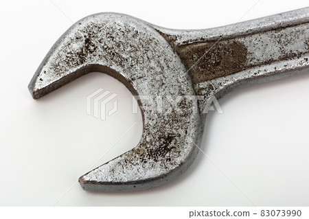 old wrench on white background old wrench on white background 83073990
