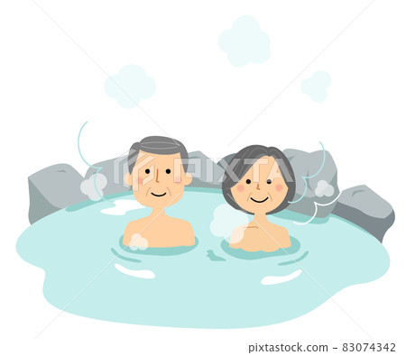 Senior couple entering a hot spring Senior couple entering a hot spring 83074342