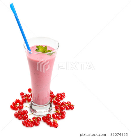 Red currant and glass with fruit smoothie isolated on white . free space for text. 83074535