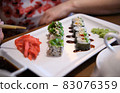 rolls without fish on a white plate 83076359
