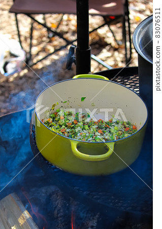 Getting ready to make soup while camping Getting ready to make soup while camping 83076511