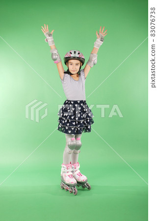 Girl with rollerskates Girl with rollerskates 83076738