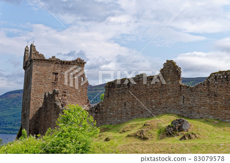 Urquhart Castle on the shore of Loch Ness Urquhart Castle on the shore of Loch Ness 83079578