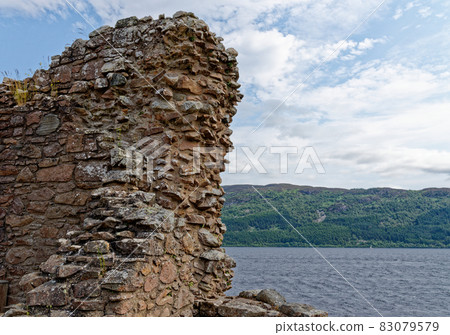 Urquhart Castle on the shore of Loch Ness Urquhart Castle on the shore of Loch Ness 83079579