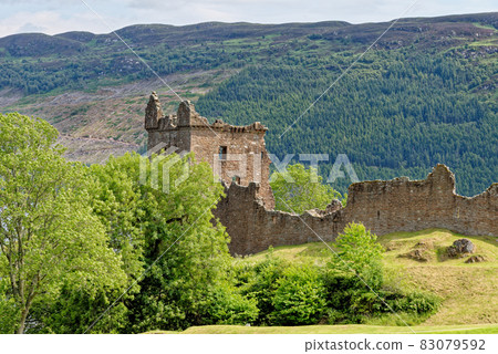 Urquhart Castle on the shore of Loch Ness Urquhart Castle on the shore of Loch Ness 83079592