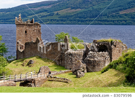 Urquhart Castle on the shore of Loch Ness Urquhart Castle on the shore of Loch Ness 83079596