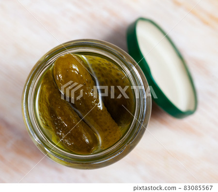 Glass jar of pickled cucumbers 83085567