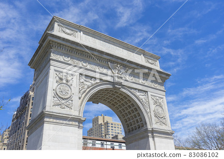 New York City, USA - April 26,2018 : The Washington Square Arch in a sunny spring day in New York City,USA on April 26,2018. New York City, USA - April 26,2018 : The Washington Square Arch in a sunny spring day in New York City,USA on April 26,2018. 83086102