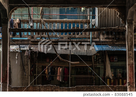 Front view of the balcony on which clothes are dried of the old building. Front view of the balcony on which clothes are dried of the old building. 83088545