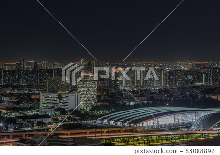 Aerial view of Bang Sue central station with skyscrapers background at night. 83088892