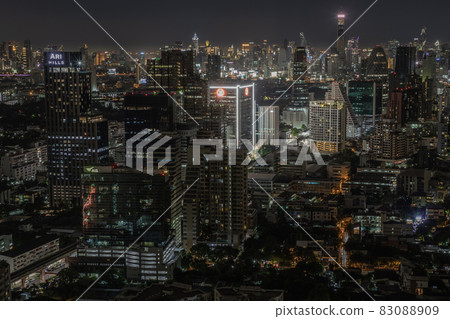 Bangkok downtown cityscape with skyscrapers at night give the city a modern style. Bangkok downtown cityscape with skyscrapers at night give the city a modern style. 83088909