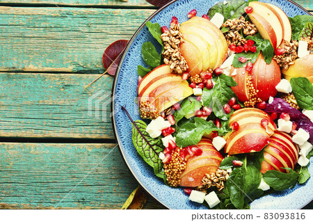 Autumn salad with apple, herbs and oatmeal Autumn salad with apple, herbs and oatmeal 83093816