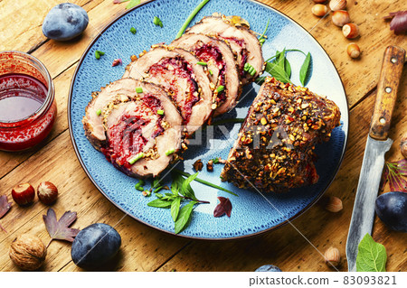 Piece meatloaf with plum 83093821