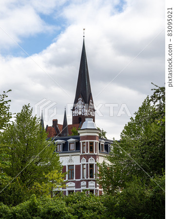 Sail boats in the port of Flensburg, St. Jorgen's Church in the background. Schleswig-Holstein in Germany Sail boats in the port of Flensburg, St. Jorgen's Church in the background. Schleswig-Holstein in Germany 83095021