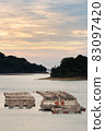 Kujukushima and aquaculture raft at sunset 83097420