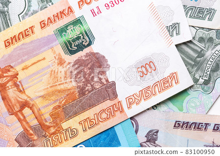Russian ruble. Russian currency closeup in the form of texture. Russian ruble. Russian currency closeup in the form of texture. 83100950