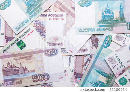 Russian ruble. Russian currency closeup in the form of texture. Russian ruble. Russian currency closeup in the form of texture. 83100954