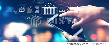 Online banking concept with city lights at night Online banking concept with city lights at night 83107556