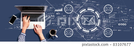Email concept with person using laptop Email concept with person using laptop 83107677