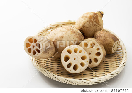 Lotus root on a white background Lotus root on a white background 83107713