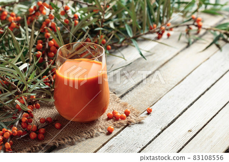 Sea buckthorn juice with fresh berries. Sea buckthorn juice with fresh berries. 83108556