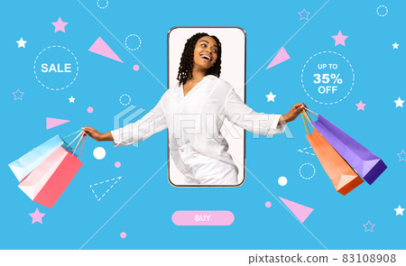 Positive black lady with shopper bags coming out of mobile phone screen, feeling excited over big sale, shopping online Positive black lady with shopper bags coming out of mobile phone screen, feeling excited over big sale, shopping online 83108908