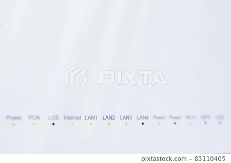 Close-up view of Internet wi-fi router device. Icons on the Wi-Fi router indicating the signal and connection. Wi-Fi modem router. Fast internet modem device Close-up view of Internet wi-fi router device. Icons on the Wi-Fi router indicating the signal and connection. Wi-Fi modem router. Fast internet modem device 83110405