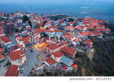 Aerial view of Sighnaghi overlooking Alazani Valley at twilight Aerial view of Sighnaghi overlooking Alazani Valley at twilight 83110543