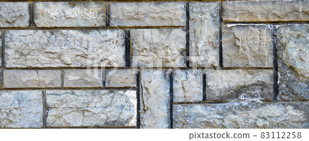 Sturdy blue and gray cut stone wall, seamless lined up 83112258