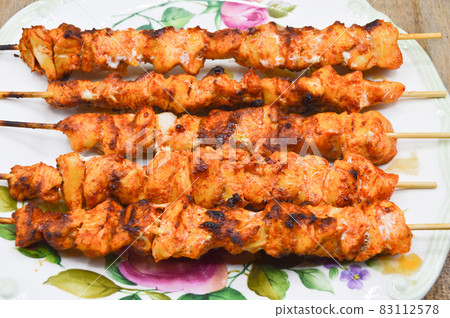 Dining table and chicken shish kebab in a luxury restaurant, delicious tavuk sis kebab 83112578