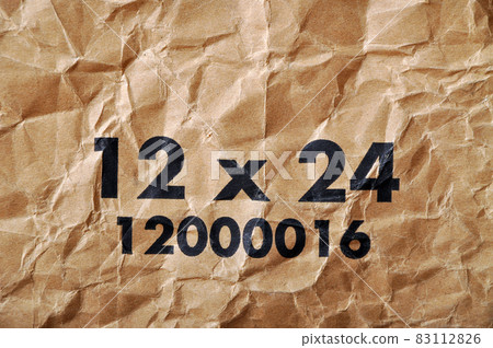 Brown and beige corrugated cardboard and warning signs detail Brown and beige corrugated cardboard and warning signs detail 83112826