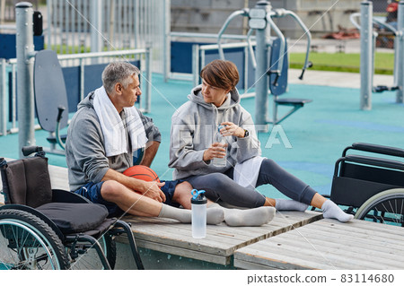 Mature friends resting after training 83114680