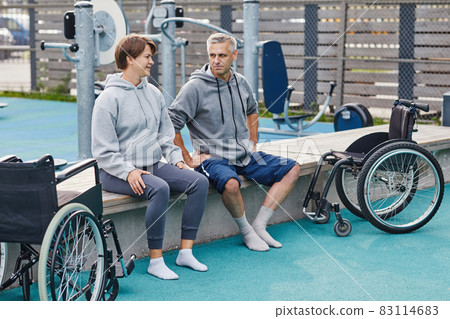 Patients with disability exercising outdoors Patients with disability exercising outdoors 83114683