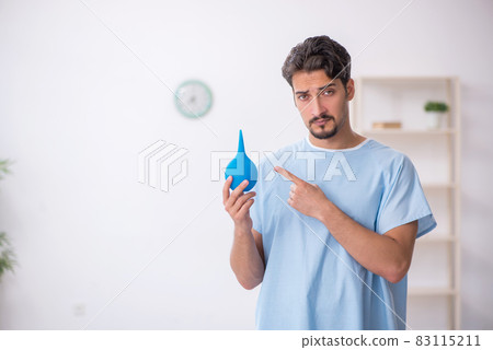 Young male patient waiting for doctor gastroenterologist Young male patient waiting for doctor gastroenterologist 83115211